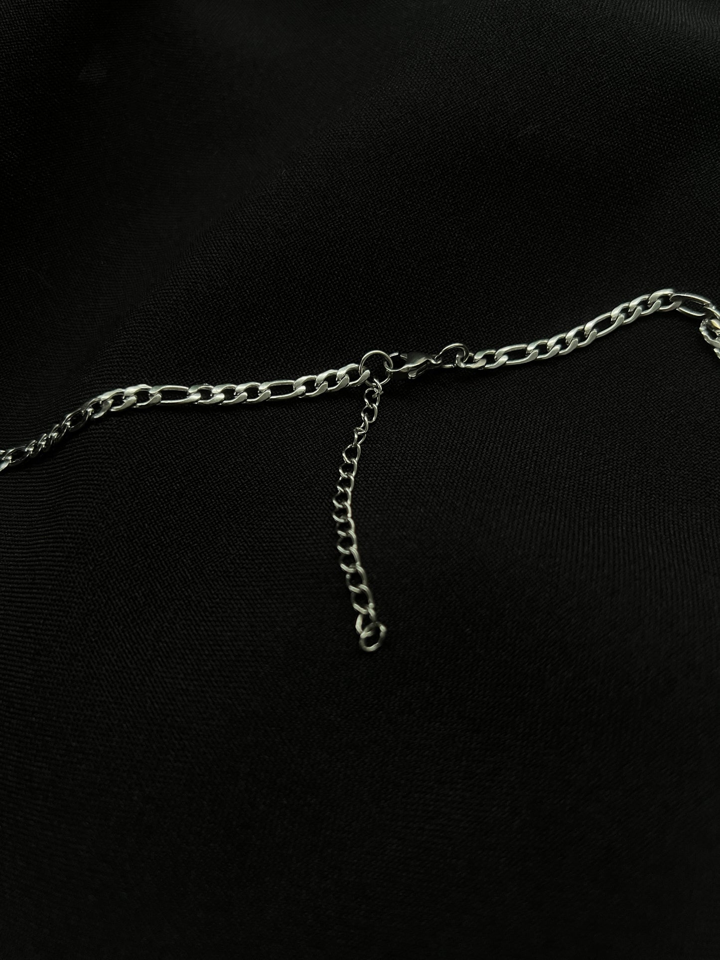 Medium sized crucifix Necklace (Figaro Chain)